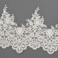 Randgarnering couture kant 25cm met pailletten kleur 111 ivory