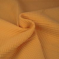 Wafelstof wafeldoek oker geel
