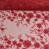 Haute couture rood  met parels 