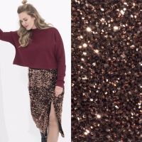Pailletten verwerkt op velours brons