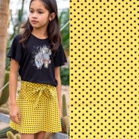 stretch crepe polyester dots geel zwart