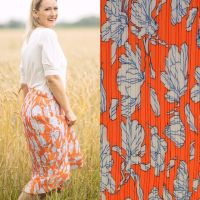 Plisse met bloemen oranje